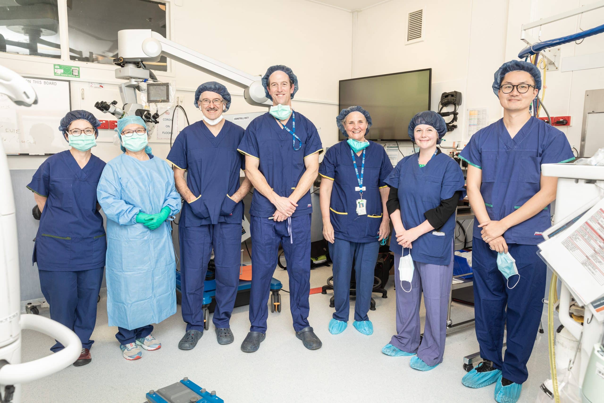 Melbourne ophthalmologist Dr Tom Edwards (centre), with the team that helped perform the procedure.