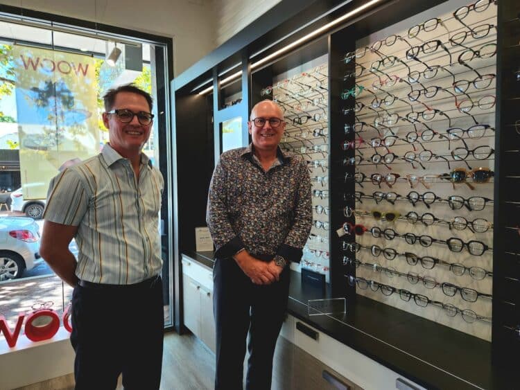 Business partners Wayne McCarthy (left) and Barry Telfer  and their Face à Face display within their Perth practice. Image: Angelo Street Optical.