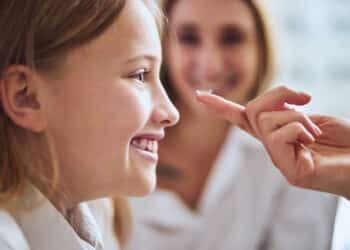 Spending more time with a patient is one way to keep the new contact-lens wearer smiling. Image: Svitlana/stock.adobe.com.