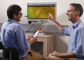 Professor Angus Turner (right) and the Lions Outback Vision team have won an award with their mobile retinal scanner. Image: Lions Outback Vision.