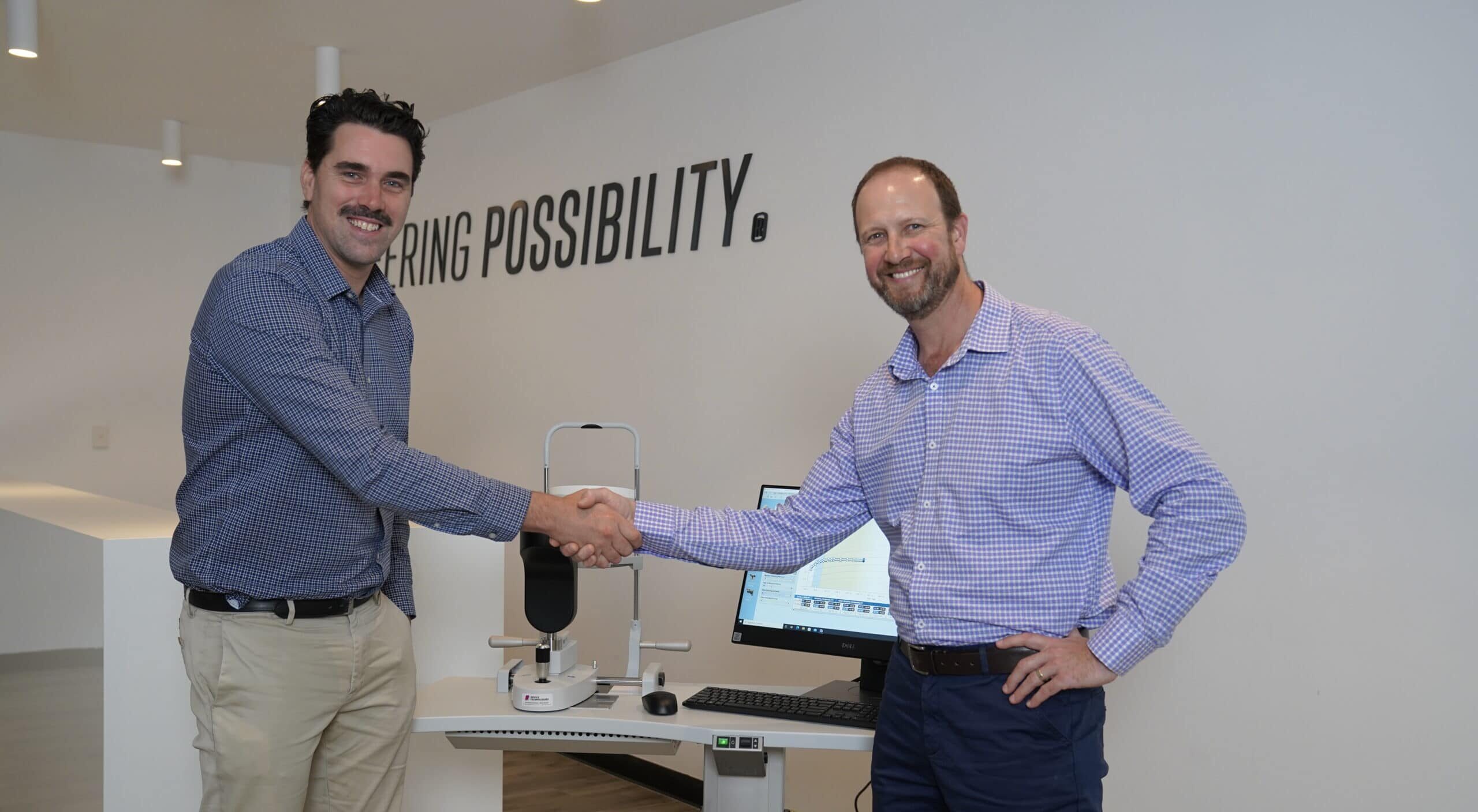 Angus Hatfield-Smith, of Device Technologies (left), and Ulli Hentschel, of Hoya Australia.