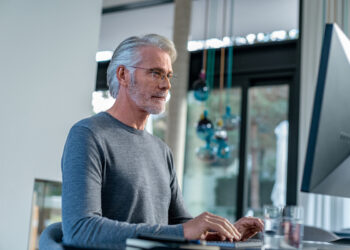 Occupational lenses for computer use hold the key to overcoming potential back and neck issues for progressive lens wearers. Image: Rodenstock.