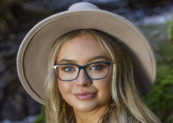 A model wears a pair of sustainably produced glasses, made with biodegradable acetate. Image: Eyes Right Optical.