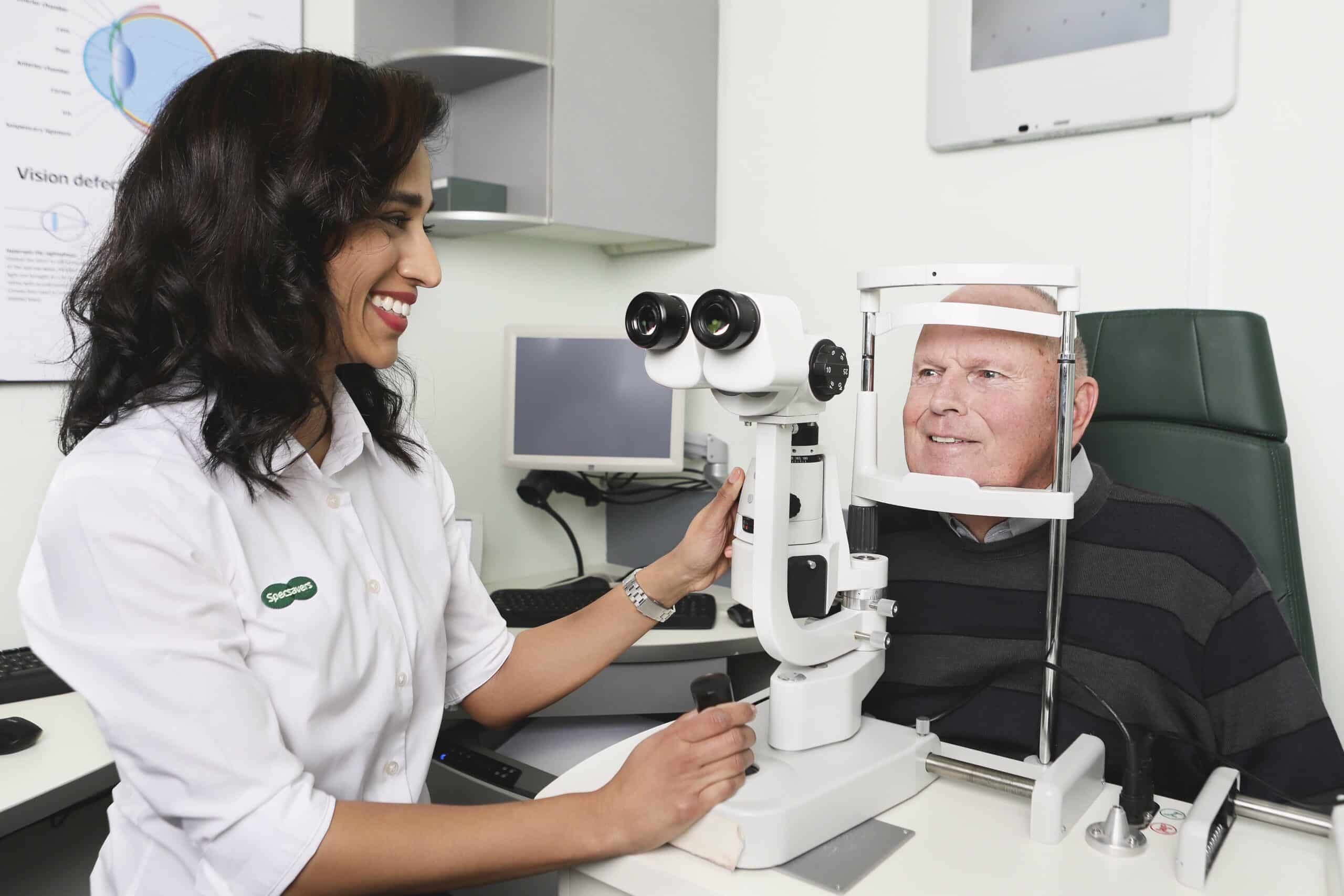 Optometrist Greeshma Patel with a patient at the Specsavers Sydney CBD store.